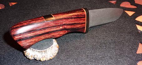 Damascus knife 15N20/o2, quenching oil, cocobolo wood handle, buffalo horn guard , brass and red inserts 