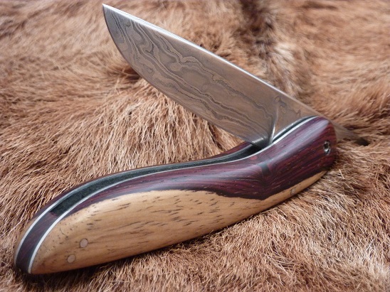 Folding knife piemontais, damascus blade 54 layers O2, C75 and 15N20, two-colored cocobolo handle , stainless steel plates 